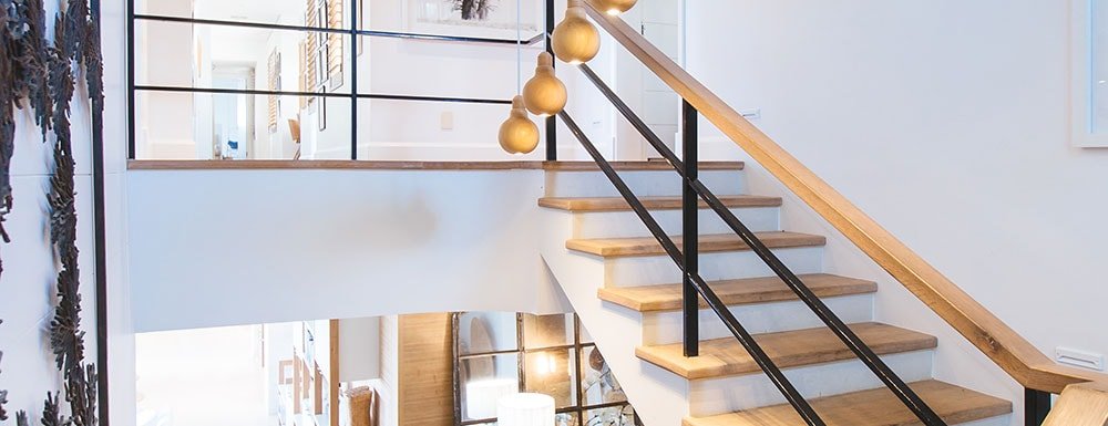 A modern home representing
                            Desire Click Realty's focus